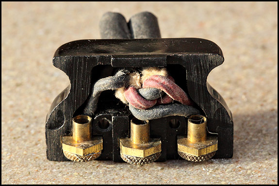 Photo of inside of vintage Singer sewing machine motor plug