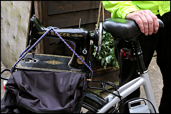 Singer 99k sewing machine on bicycle